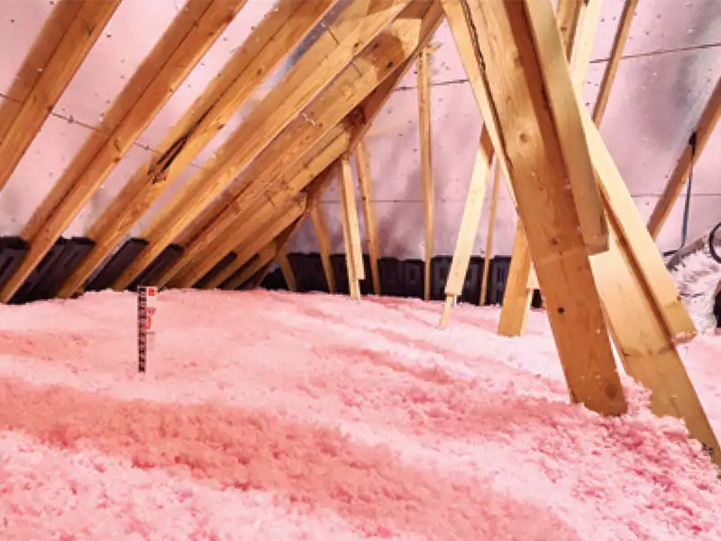How does blown-in insulation compare to batts and rolls?